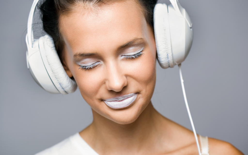 woman wearing white headphones