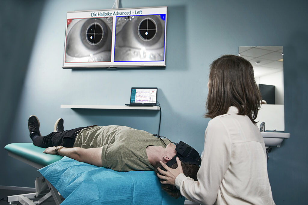 medical professional using eye tracking equipment